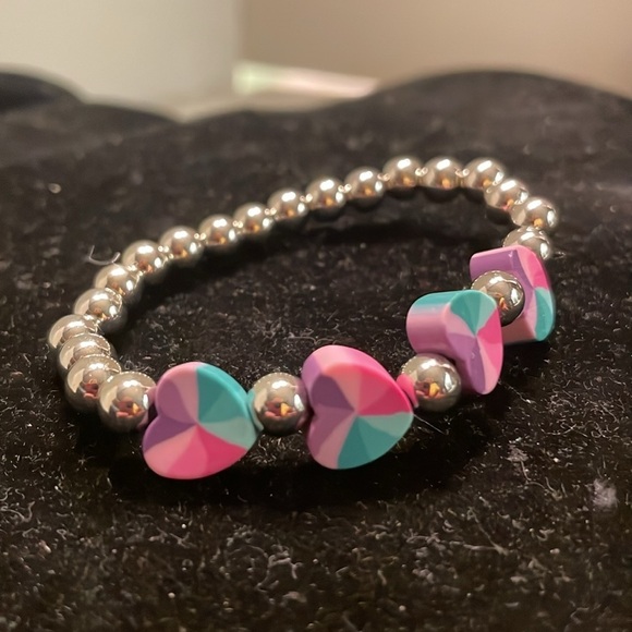7” beaded stackable stretch bracelet with 23 silver beads & 4 heart shaped beads - Picture 5 of 13
